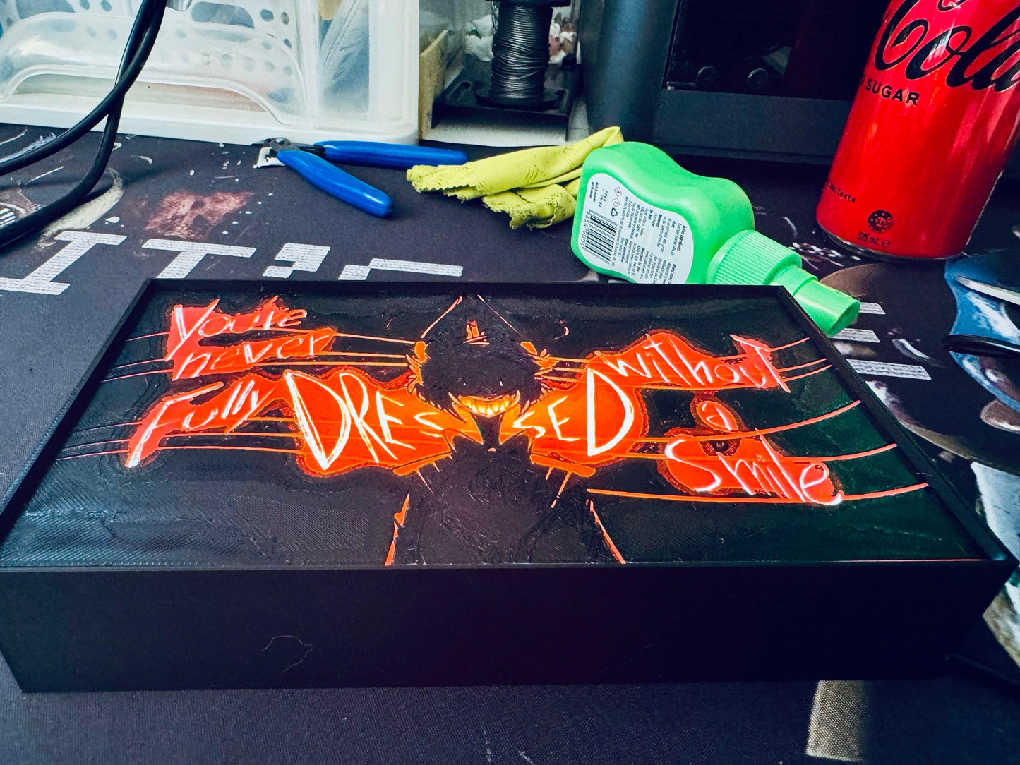 Hazbin Hotel: You're never fully dressed without a Smile! Light up Sign - Michael's 3D World