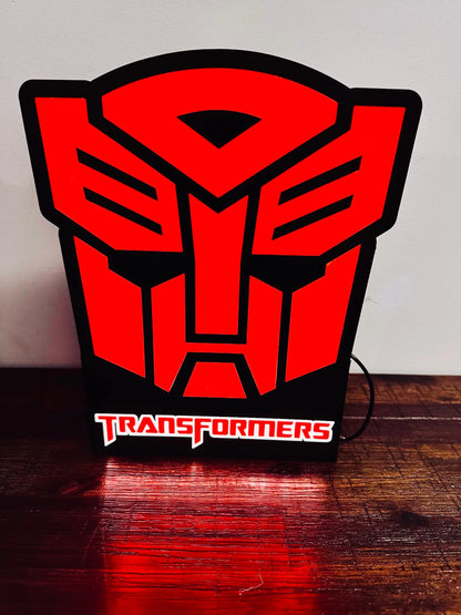 Transformers: Logotipos de Decepticon y Autobots: ¡Letreros iluminados!