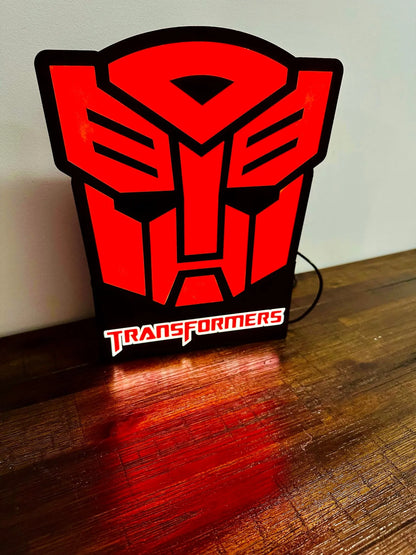 Transformers: Logotipos de Decepticon y Autobots: ¡Letreros iluminados!