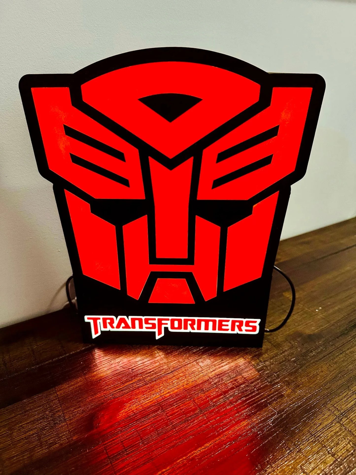 Transformers: Logotipos de Decepticon y Autobots: ¡Letreros iluminados!
