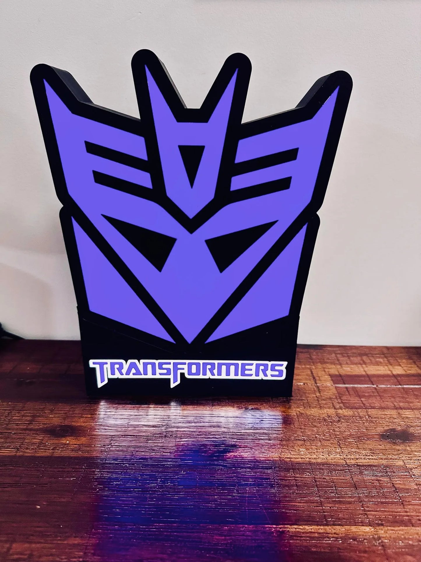 Transformers: Logotipos de Decepticon y Autobots: ¡Letreros iluminados!